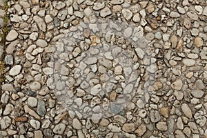 Pebble stone floor tile seamless background. Cement mixed gravel pebble stone floor texture.