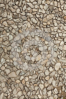 Pebble stone floor tile seamless background. Cement mixed gravel pebble stone floor texture.