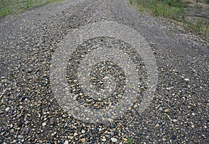 Pebble stone floor tile seamless background. Cement mixed gravel pebble stone floor texture. Wet round pebble stone rock floor in