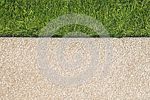 Pebble stones and grass background