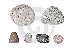 Pebble stones on white background isolated close up top view, set of smooth sea pebbles, rubble collection, different cobblestones