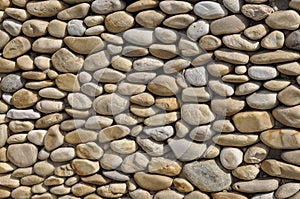 Pebble wall design background in the Park Longchamp of Marseille