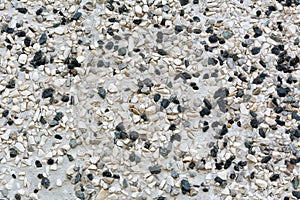 Pebble wall texture background, empty template