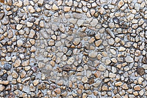 Pebble wall texture close up for background