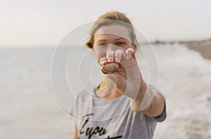 On the pebble in the woman`s hand is the inscription love