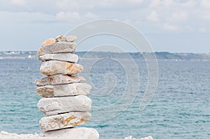 Pebbles in balance near Notre Dame de Rocamadour in Camaret-sur-mer in FinistÃÂ¨re, Brittany photo