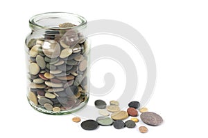 Pebbles or Beach stones in a glass jar