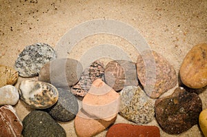 Pebbles composition on stone