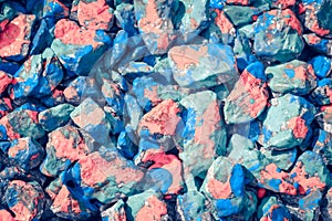 Pebbles painted bright colored paint