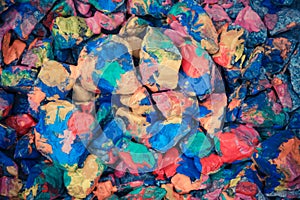 Pebbles painted bright colored paint