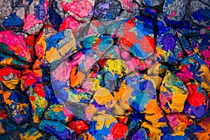 Pebbles painted bright colored paint