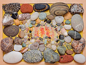 Pebbles, sand, colored stones and sea salt crystals