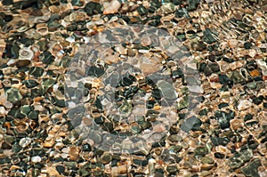 Pebbles under the clear sea water