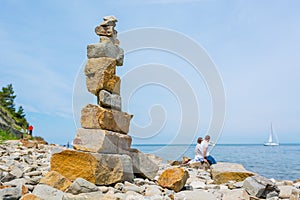 Pebbles zen tower at sea shore.