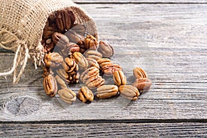 Pecan nuts in burlap bag