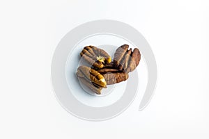 Pecan nuts isolated on white background