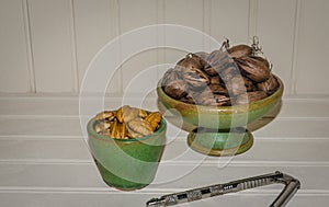 Pecan nuts, whole and cracked and shelled