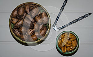 Pecan nuts, whole and cracked and shelled