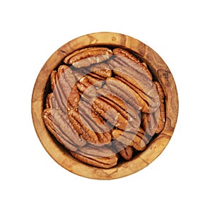 Pecan nuts in wood bowl