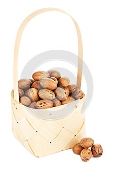 Pecan Nuts In Wooden Basket
