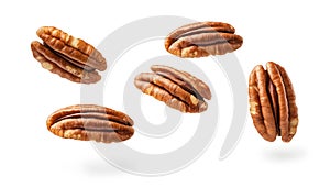 Pecans flying mid-air, isolate on white background. Collection