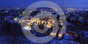 Pecs city at night from above in blue hour