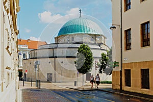 Pasha Qasim stone mosque in Pecs, Hungary. landmark building. weathered green copper cupola