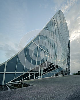 Peculiar undulating architecture and glass facade on a building in Cidade da Cultura photo