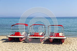 Pedal boat for rent on sandy beach