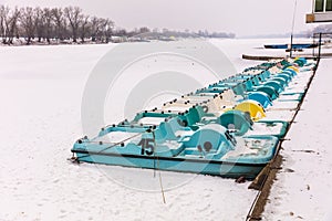 Pedal boats on a frozen lake
