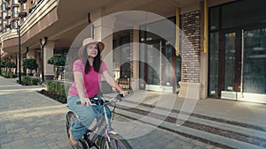 Pedal city escapade: witness the cityscape through the eyes of a lovely lady