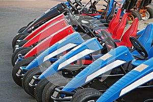 Pedal karts parked in line