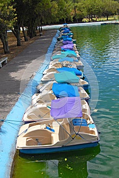 Pedal rental boats in a city park.