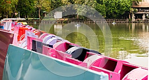 A pedalo or paddle boat is a small human-powered watercraft propelled by the action of pedals turning a paddle wheel.