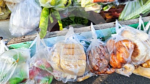 peddler that sell vegetable, snack, spice around the housing