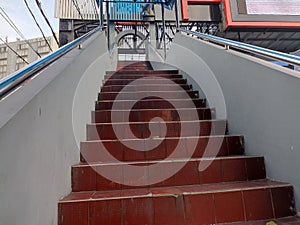 Pedestarian bridge stairs in the city