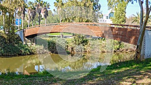 Pedestrian Bridge across the river in park Yarkon in Tel-Aviv, Israel