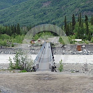 A pedestrian only bridge crossing the river to mccarthy photo