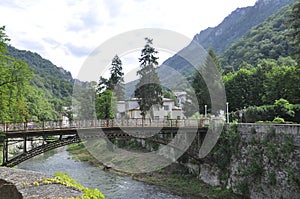 Pedestrian Bridge over Cerna River from Baile Herculane Resort in Romania