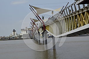 Pedestrian bridge over the Guayas river that connects Guayaquil with Santay island. photo