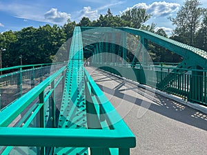 A pedestrian bridge over the Oder River in Opole, Poland, constructed using riveted technology