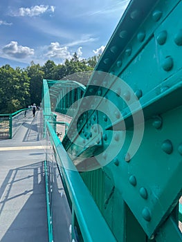 A pedestrian bridge over the Oder River in Opole, Poland, constructed using riveted technology