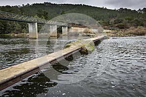 Pedestrian bridge over Zezere river at Barroca Village photo