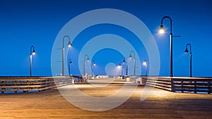 Pedestrian bridge during twilight time at Pismo beach pier