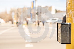 Pedestrian button on a city street crossing