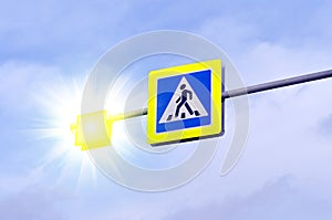Pedestrian crossing road sign symbol. Bright blue and and luminous yellow pedestrian crosswalk sign