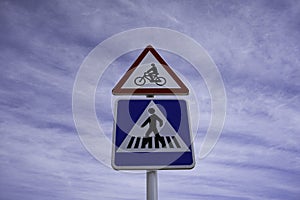 Pedestrian Crossing Sign and Bike Riding Sign