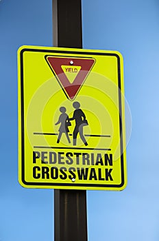 Pedestrian Crossing Sign with Blue Sky