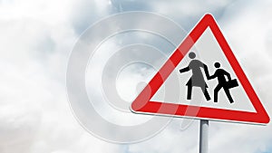 Pedestrian crossing sign board post against clouds in the blue sky