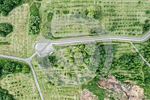 Pedestrian paths and bicycle lane in the green summer park. aerial view
